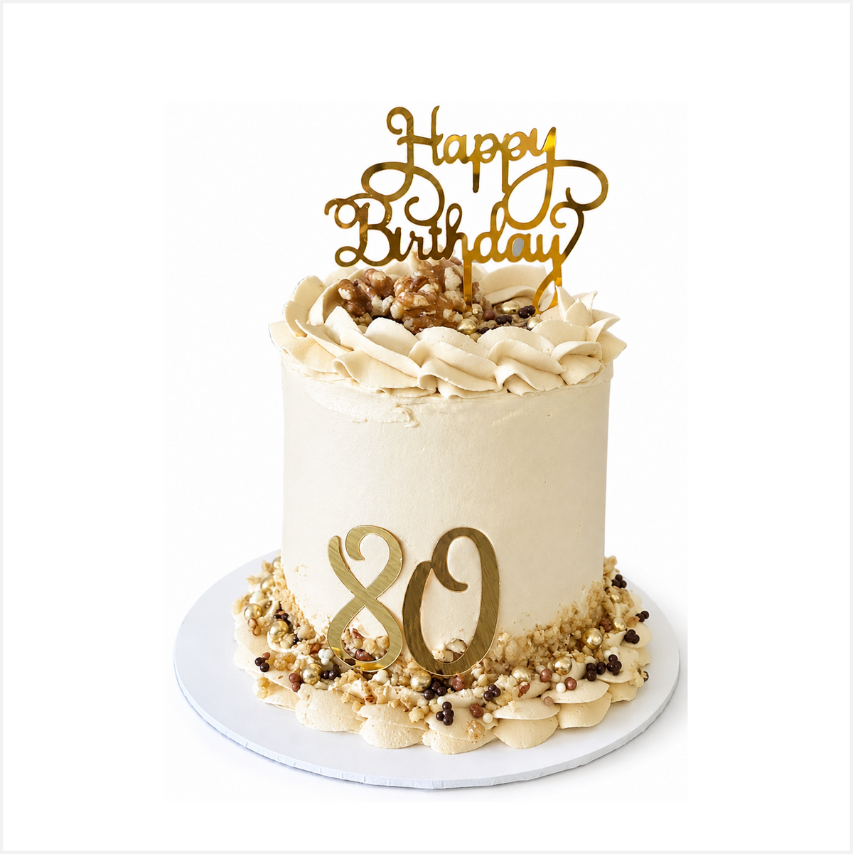 Coffee sponge cake, covered with coffee buttercream, decorated with crushed walnuts, chocolate coloured balls and whole walnuts. Perfect for team celebrations and corporate and hospitality gifting