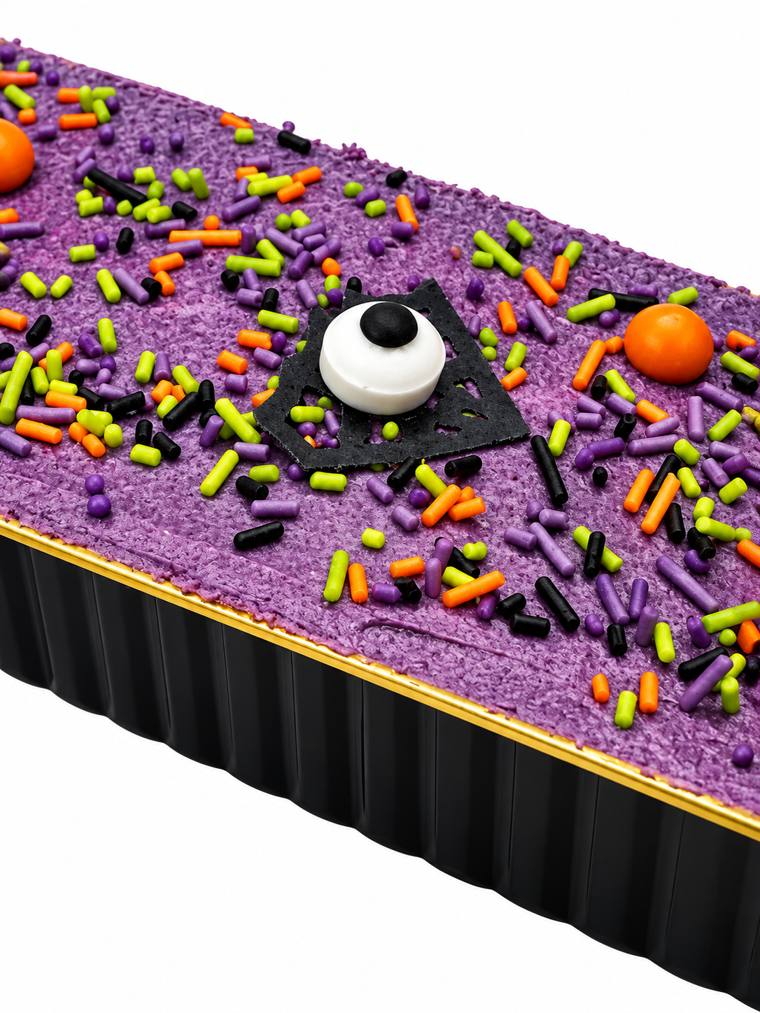 An elegant tray of pumpkin spice sponge cake, covered in spiced buttercream and topped with paired decorations. Perfect for Halloween gifting, desk drops, corporate gifting, product launches and hospitality gifting.