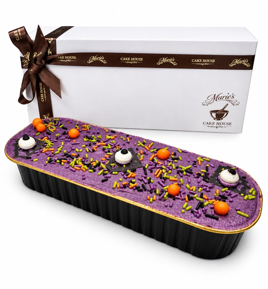 An elegant tray of pumpkin spice sponge cake, covered in spiced buttercream and topped with paired decorations. Perfect for Halloween gifting, desk drops, corporate gifting, product launches and hospitality gifting.